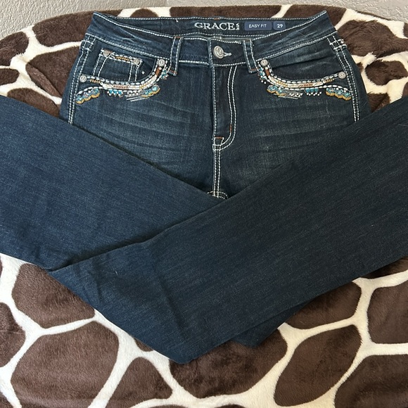 Grace jeans with blue brown and sliver trim around the pockets. - Picture 4 of 4